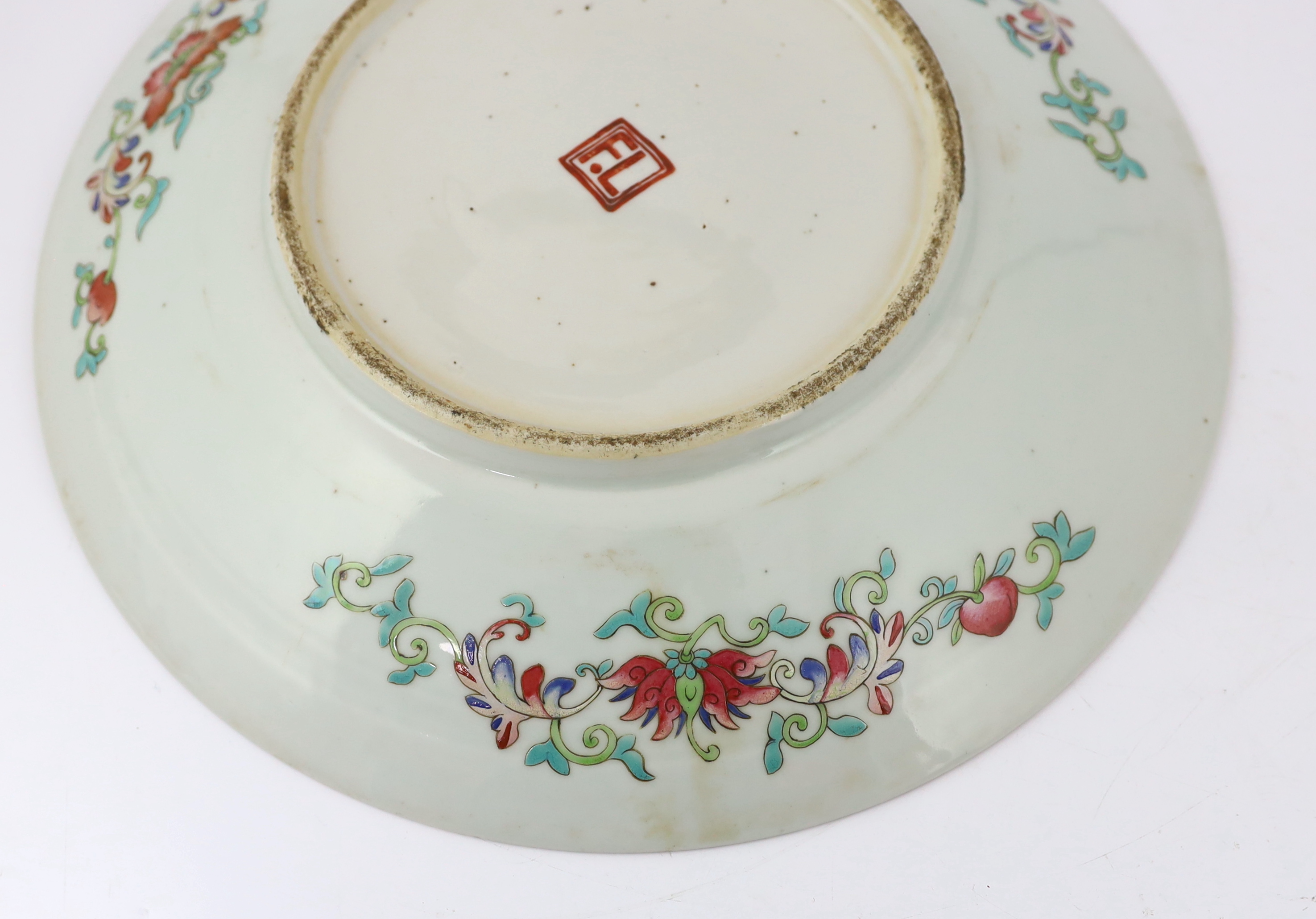 A Chinese yellow ground famille rose dish, late 19th century, with unusual Western script ‘F.L’ seal mark